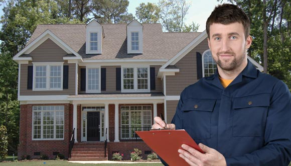 A home inspector in Naperville, Illinois, going over the checklist.